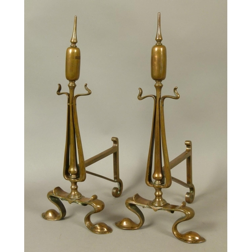 573 - A PAIR OF BRONZE ART NOUVEAU BULL RUSH ANDIRONS, scrolling feet, 48cm high, late 19th century