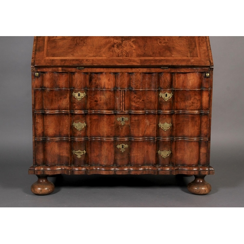 578 - A MID-TO LATE 18TH CENTURY WALNUT VENEERED BUREAU BOOKCASE, the arched top with cavetto moulded corn... 