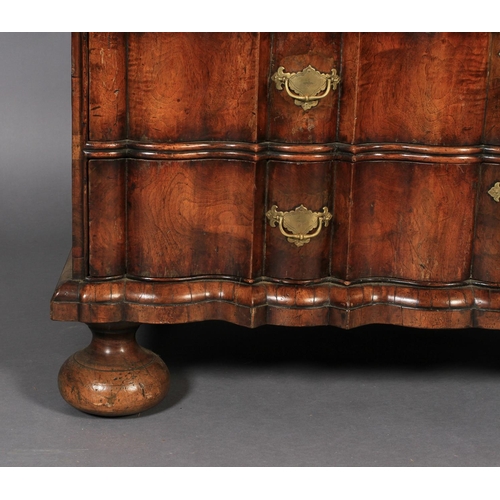 578 - A MID-TO LATE 18TH CENTURY WALNUT VENEERED BUREAU BOOKCASE, the arched top with cavetto moulded corn... 