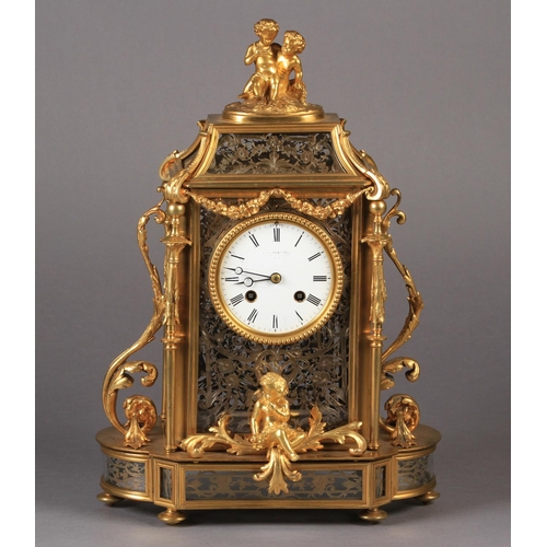 58 - A FINE FRENCH ORMOLU MANTEL CLOCK, the ornate glazed case decorated internally with floral, leaf and... 