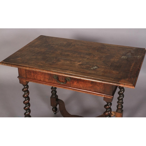 582 - A CHARLES II WALNUT VENEERED SINGLE DRAWER SIDE TABLE, the oversailing rectangular top parquetry inl... 