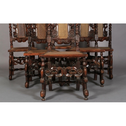 583 - A SET OF SIX CHARLES II STYLE WALNUT SIDE CHAIRS, 19th century pierced and foliate carved cresting f... 