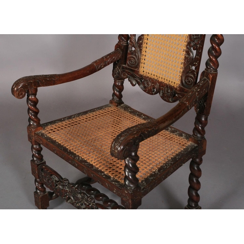 586 - A CHARLES II WALNUT ARMCHAIR 17TH CENTURY AND LATER, having a pierced cresting carved with an eagle ... 