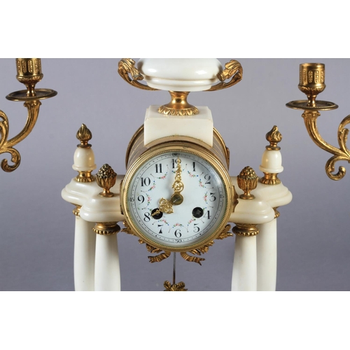 59 - A LATE 19TH CENTURY FRENCH WHITE MARBLE AND GILT METAL three piece clock garniture, the clock with d... 