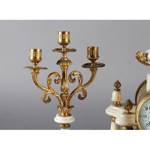 59 - A LATE 19TH CENTURY FRENCH WHITE MARBLE AND GILT METAL three piece clock garniture, the clock with d... 