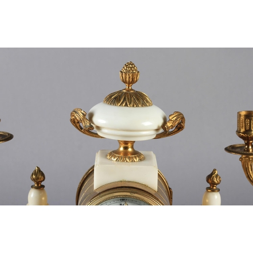 59 - A LATE 19TH CENTURY FRENCH WHITE MARBLE AND GILT METAL three piece clock garniture, the clock with d... 