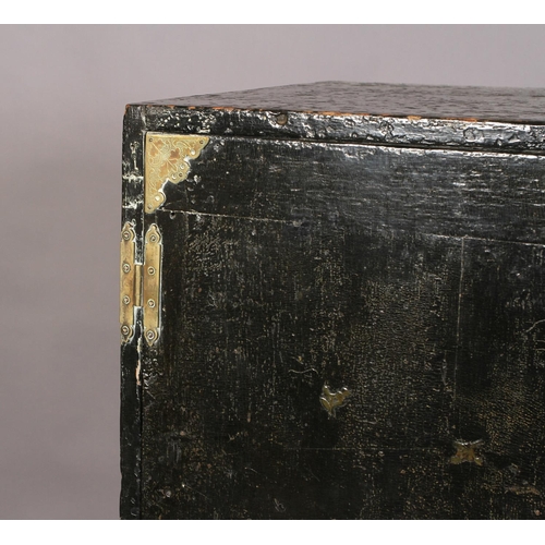 596 - A 17TH CENTURY BLACK LACQUER CABINET ON STAND, the pair of doors highlighted with sprigs of oak leav... 