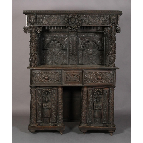 602 - AN OAK DRESSER/CUPBOARD in 16th century style, dentil moulded cornice above a frieze centred on a gr... 