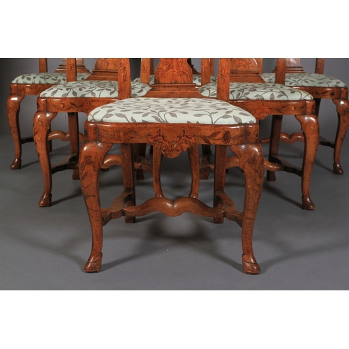 606 - A SET OF SIX 18TH CENTURY DUTCH ELM AND FLORAL MARQUETRY CHAIRS, the arched top rails inlaid with sw... 