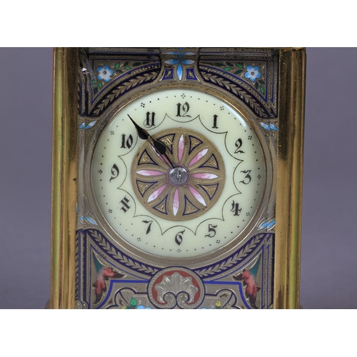 61 - A LATE 19TH CENTURY BRASS CASED HOUR REPEATING CARRIAGE CLOCK the silvered face finely engraved and ... 