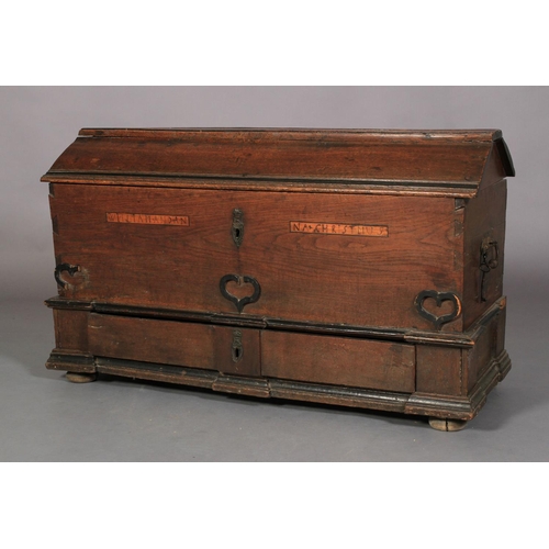 611 - A SWEDISH OAK MARRIAGE CHEST late 18th century having a domed top, the front inlaid with two panels ... 