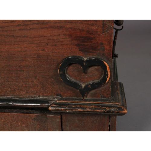 611 - A SWEDISH OAK MARRIAGE CHEST late 18th century having a domed top, the front inlaid with two panels ... 