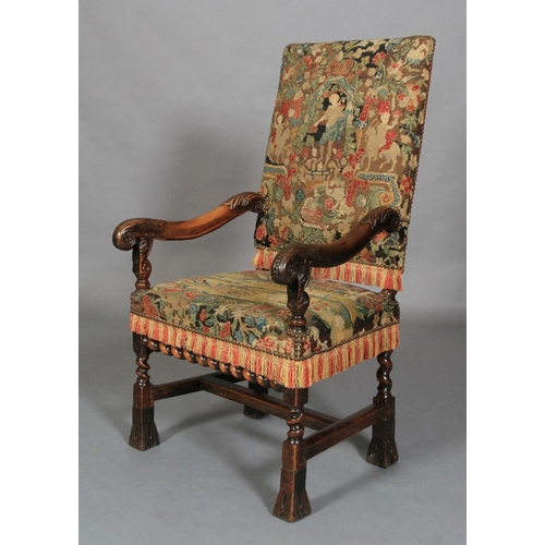 623 - A WALNUT OPEN ARMCHAIR, 17th century and later, the rectangular high back and seat upholstered in ne... 