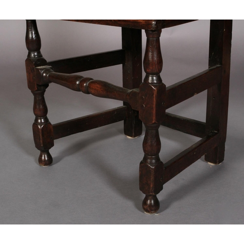 626 - A LATE 17TH CENTURY OAK SINGLE CHAIR c.1690 having a pierced and scrolled cresting above a slate bac... 