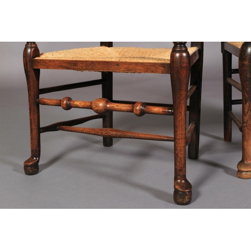 631 - TWO SIMILAR 19TH CENTURY ELM AND FRUITWOOD SPINDLE BACK CARVERS, each having three rows of spindles,... 