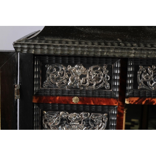 65 - A FLEMISH EBONY VENEERED TABLE CABINET late 17th century, the hinged top above a cavetto frieze and ... 