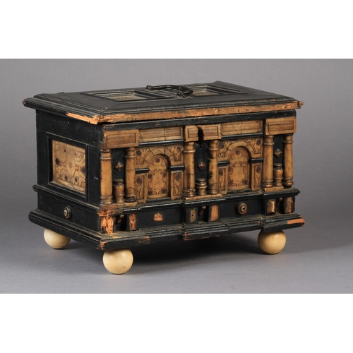 67 - A FLEMISH EBONISED CASKET OF LATE 17TH CENTURY STYLE, rectangular, the front of architectural design... 