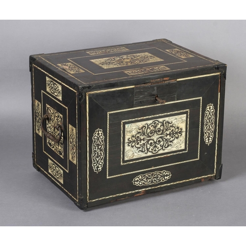 68 - AN EARLY 17TH CENTURY GERMAN EBONY VENEERED AND IVORY INLAID TABLE CABINET inlaid with rectangular a... 