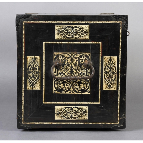 68 - AN EARLY 17TH CENTURY GERMAN EBONY VENEERED AND IVORY INLAID TABLE CABINET inlaid with rectangular a... 