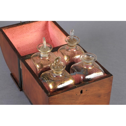 70 - A DUTCH MAHOGANY DECANTER BOX c.1810, having a cylinder hinged lid, the interior fitted with four gi... 