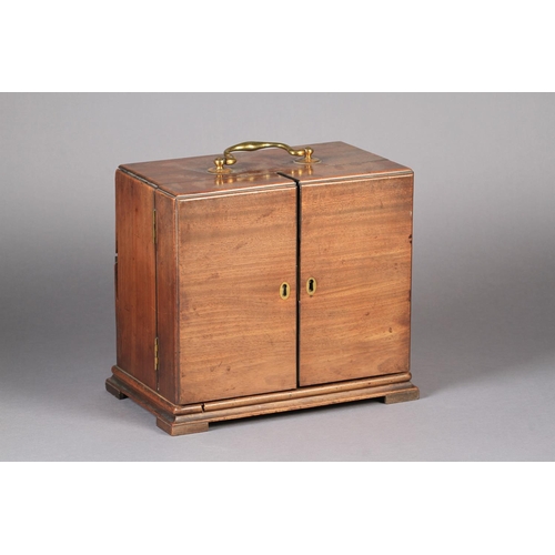 71 - A GEORGE III MAHOGANY APOTHECARY'S CABINET the divided hinged front enclosing a fitted interior of d... 