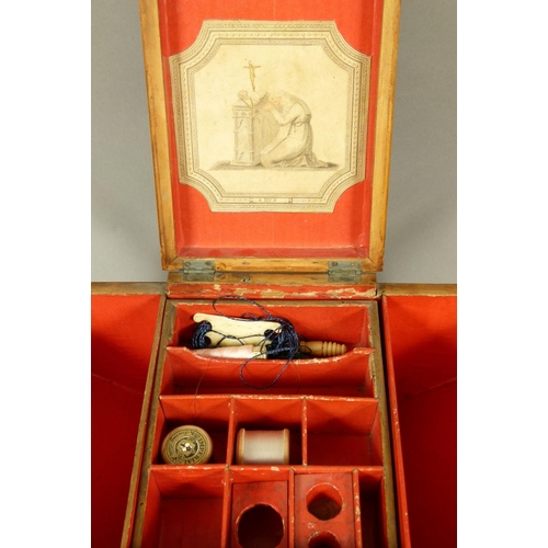 76 - A REGENCY COROMANDEL WORK BOX of 'Ark' form, the front with kite shaped keyplate, hinged central lid... 