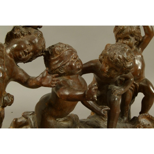 79 - 19TH CENTURY FRENCH SCHOOL - Terracotta of four lightly draped and naked infants, one blindfolded, a... 