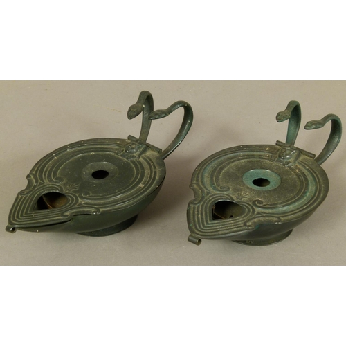 80 - A PAIR OF LATE 19TH CENTURY ROMAN STYLE LAMPS, bronze-finished the pierced cover with Egyptian motif... 