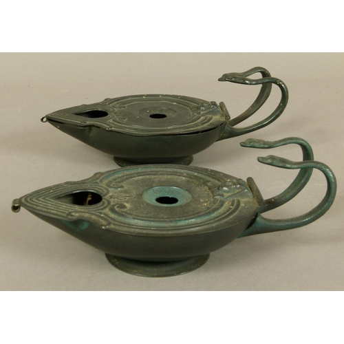 80 - A PAIR OF LATE 19TH CENTURY ROMAN STYLE LAMPS, bronze-finished the pierced cover with Egyptian motif... 