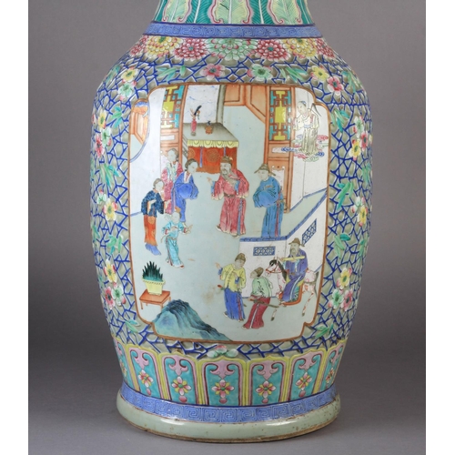 86 - A LARGE CANTONESE VASE c.1850, the baluster form painted with figures on a terrace within a gilt-lin... 