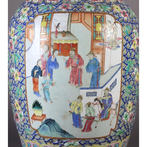 86 - A LARGE CANTONESE VASE c.1850, the baluster form painted with figures on a terrace within a gilt-lin... 