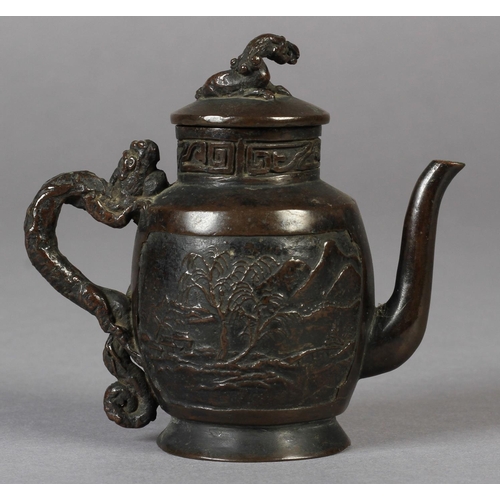 88 - A SMALL CHINESE BRONZE WINE POT, 18TH CENTURY, the domed cover with mythical creature finial, the ov... 