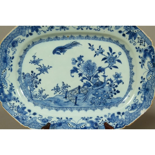 92 - TWO CHINESE BLUE AND WHITE DISHES, late 18th/early 19th century of oblong form, painted with rocks i... 