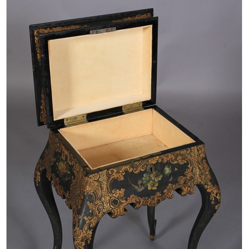 520 - AN EARLY VICTORIAN PAPIER MACHE WORK TABLE in the manner of Jennens & Betteridge, the hinged lid dec... 