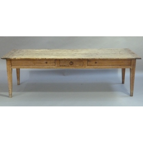 619 - A FRENCH OAK FARMHOUSE TABLE, having a planked top with cleat ends, the apron having a small drawer ... 