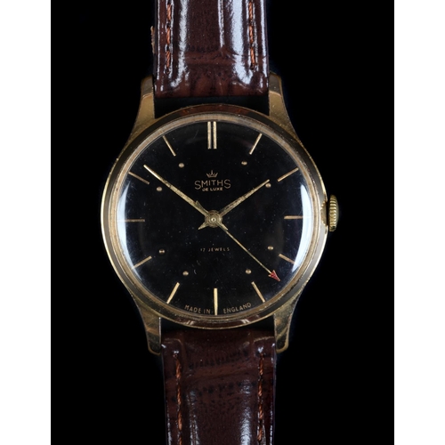 160 - A Smiths De Luxe gentleman's gold plated wristwatch c.1960, manual, 17 jewel lever movement, black d... 