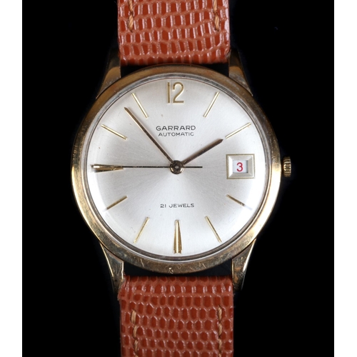 59 - A Garrard gentleman's 9ct gold wristwatch c.1965, automatic, 21 jewel lever movement, silvered sunbu... 