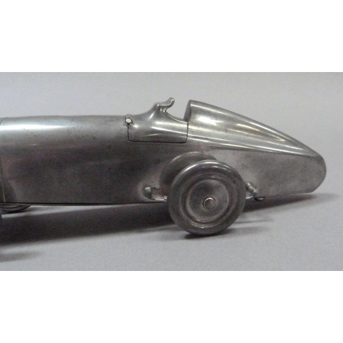 1 - An Art Deco MG Midget table lighter, by Enturn Pewter, pat. no. 373219, 19.5cm long