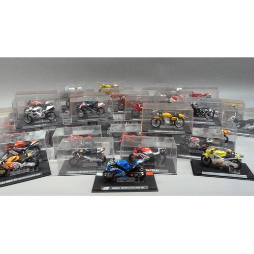 101 - Model Racing Bikes 1:24, forty-five models including Ducati, Yamaha and Honda, each in a perspex dis... 