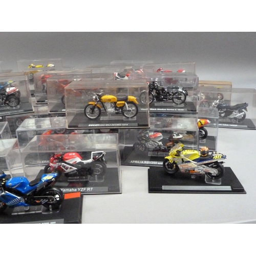 101 - Model Racing Bikes 1:24, forty-five models including Ducati, Yamaha and Honda, each in a perspex dis... 