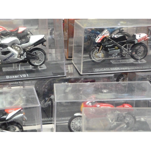 101 - Model Racing Bikes 1:24, forty-five models including Ducati, Yamaha and Honda, each in a perspex dis... 