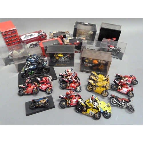 104 - A quantity of model racing bikes, 1:18 and 1:24 scale (13), together with various boxes and display ... 