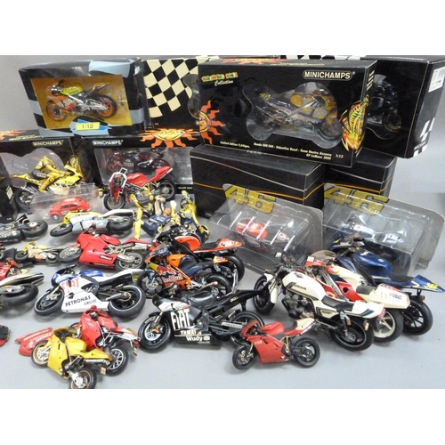 105 - A box of model racing bikes, mainly Minichamps, damaged or parts missing, some with original boxes