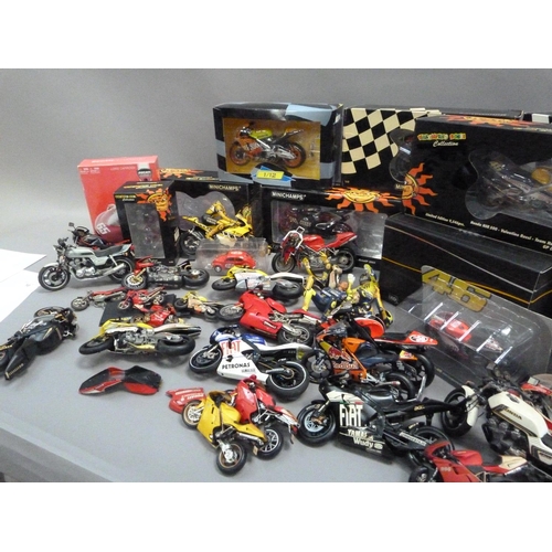 105 - A box of model racing bikes, mainly Minichamps, damaged or parts missing, some with original boxes