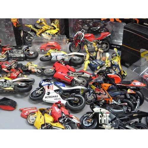 105 - A box of model racing bikes, mainly Minichamps, damaged or parts missing, some with original boxes