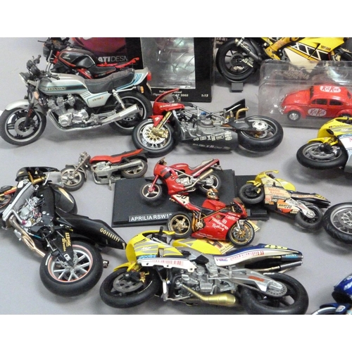 105 - A box of model racing bikes, mainly Minichamps, damaged or parts missing, some with original boxes