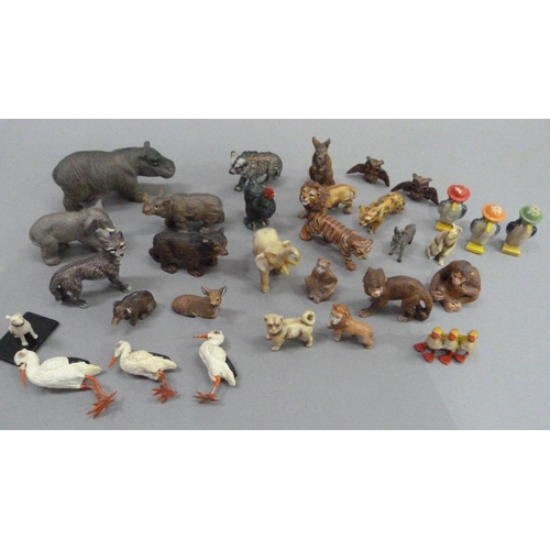 11 - A small collection of wild animal models, c.1940, including tiger, lion, hippopotamus, monkey, ape, ... 