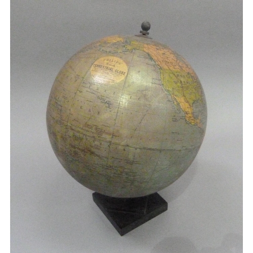 12 - A Phillips 9 inch terrestrial globe, c.1944, on black square stepped base