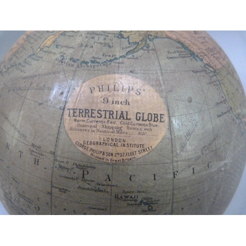 12 - A Phillips 9 inch terrestrial globe, c.1944, on black square stepped base