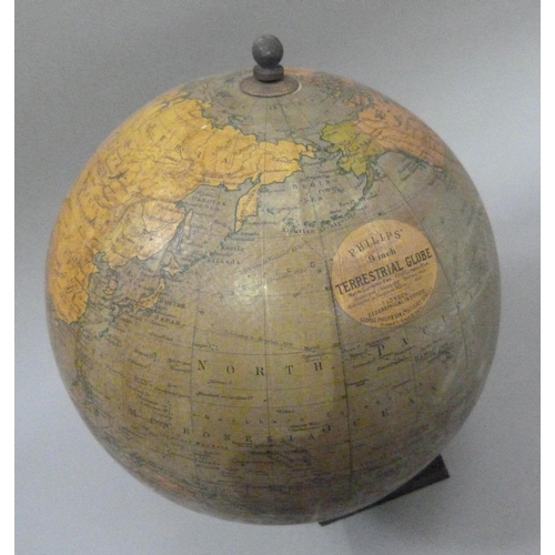 12 - A Phillips 9 inch terrestrial globe, c.1944, on black square stepped base